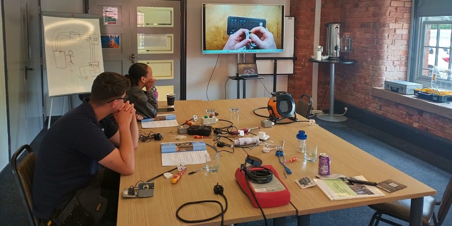 Learners on a PAT testing course in Preston watching a practical electrical safety demonstration